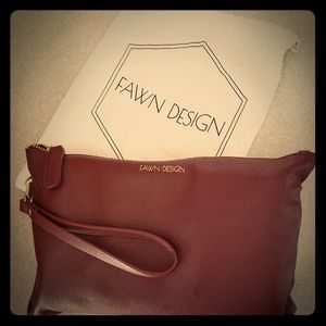 Fawn design diaper clutch wine color